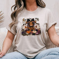 Sand Gildan Softstyle tee mockup with a highland cow wearing a bow surrounded by pumpkins and ghosts