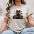Sand Gildan Softstyle tee mockup with a ghost in a leopard print veil and bow with bats and pumpkins