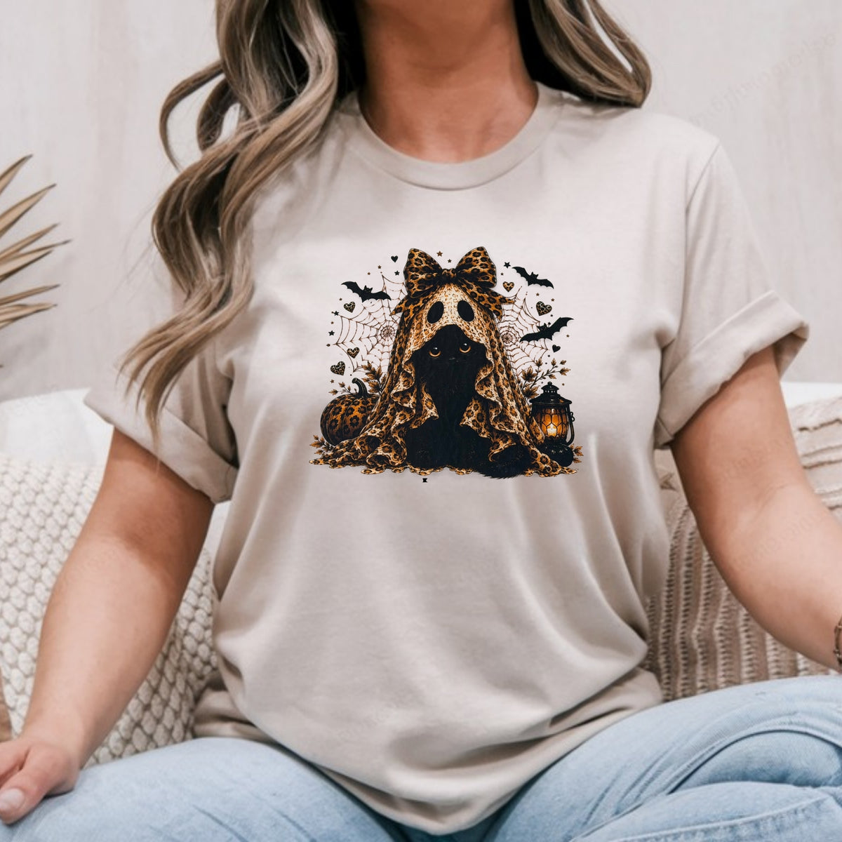 Sand Gildan Softstyle tee mockup with a ghost in a leopard print veil and bow with bats and pumpkins